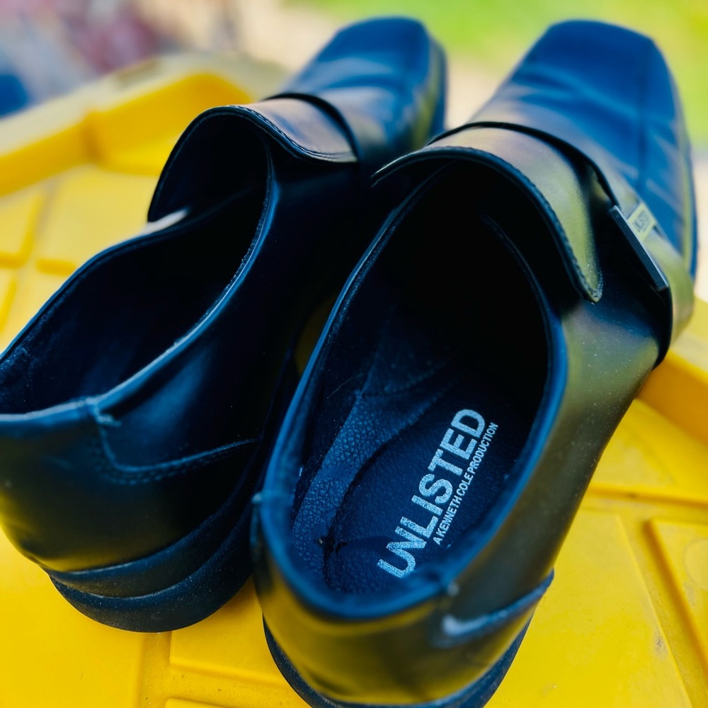 Unlisted Kenneth Cole black men’s dress shoe with silver buckle